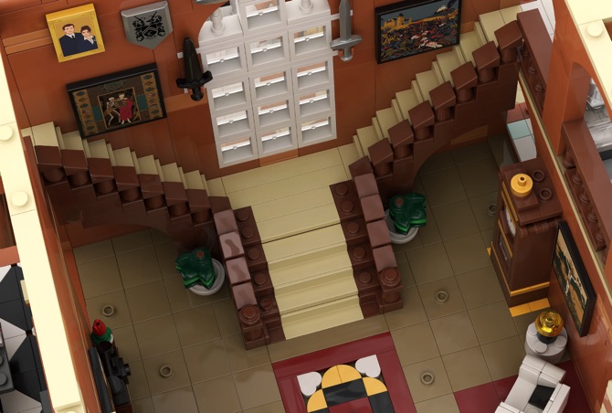 The grand hall in brick, with its double staircase